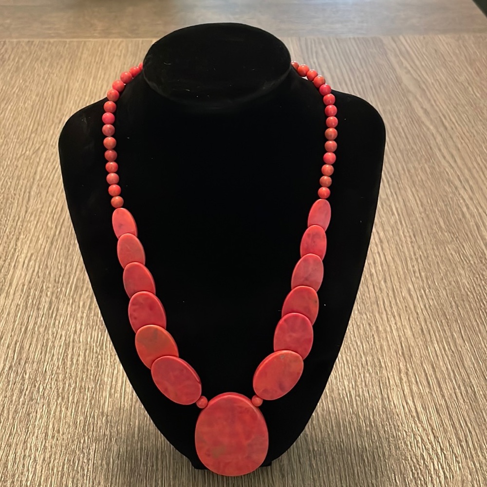 Red stone necklace.